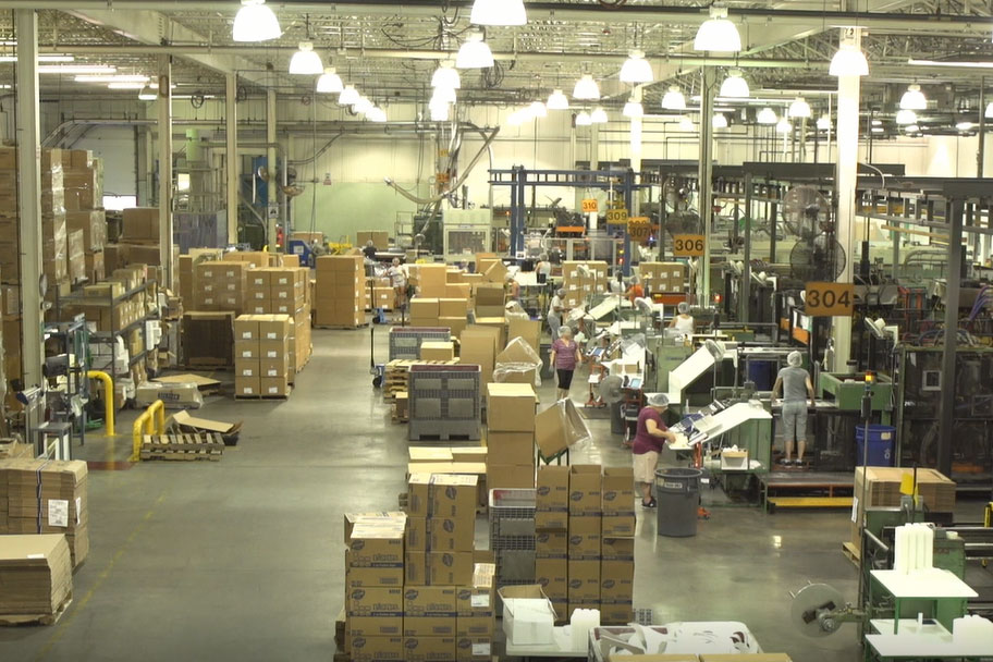 EasyPak warehouse with employees wearing purple shirts