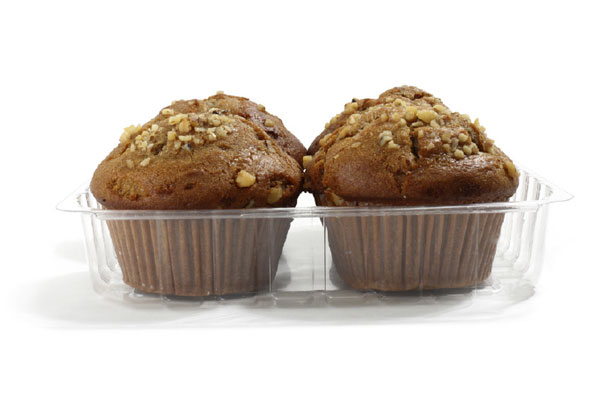 sweet muffins in plastic container